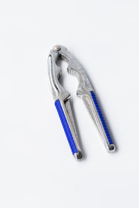 High angle view of electric lamp against white background