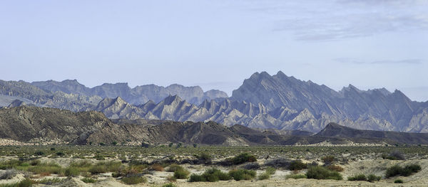 Scenic view of landscape and mountains against sky