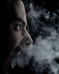 Portrait of man smoking