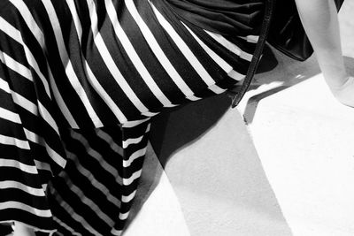 Low section of person standing outdoors