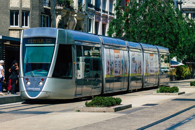 Train on street in city