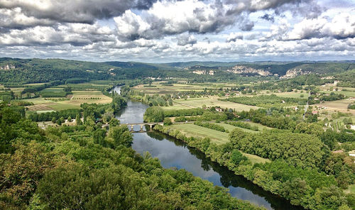 High angle view of river amidst landscape against sky