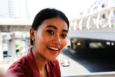 Portrait of young woman smiling