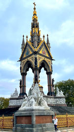 Statue of historic building against sky