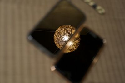High angle view of camera on wood