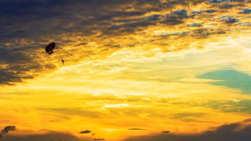 Low angle view of orange cloudy sky