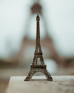 Close-up of tower against building