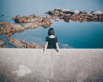 Full length of woman standing on beach