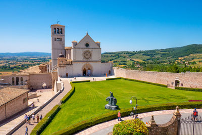 The wonderful basilica of st. francis in assisi, italy, during a summer sunny day.