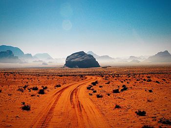 Scenic view of desert against sky