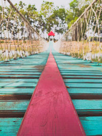 Close-up of footbridge over footpath