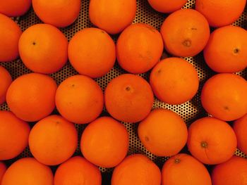 Full frame shot of oranges in market