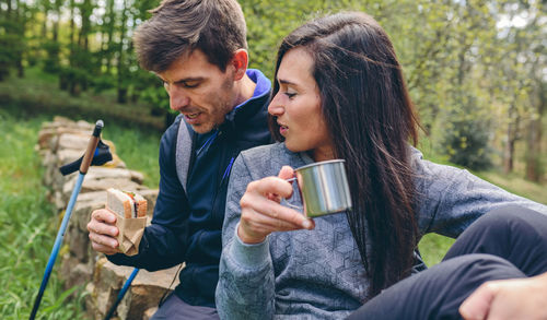 Young couple holding ice cream