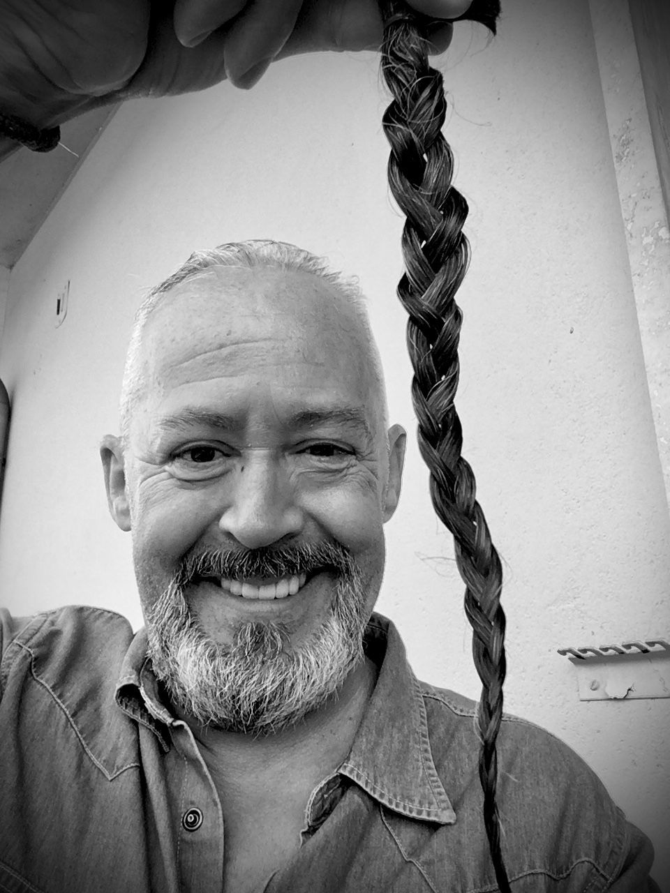 black and white, portrait, one person, adult, black, monochrome photography, monochrome, men, chain, headshot, moustache, senior adult, smiling, white, facial hair, front view, emotion, person, looking at camera, beard, happiness, close-up, mature adult, lifestyles, jewelry