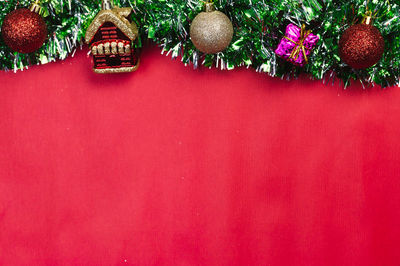 Close-up of christmas decorations hanging on tree