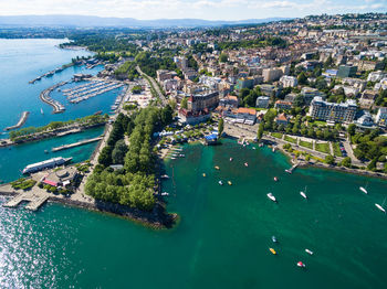 High angle view of boats in city