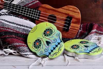 High angle view of guitar on table