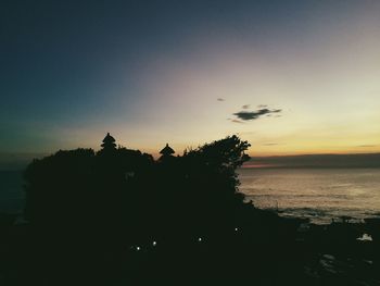 Scenic view of calm sea at sunset
