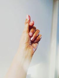 Close-up of woman hand on finger
