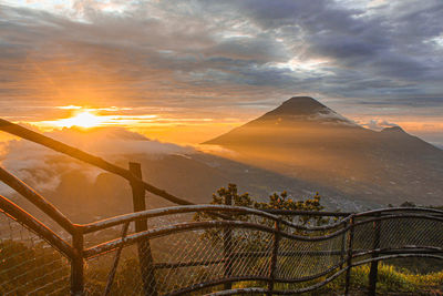 Scenic view of mountains against sky during sunset