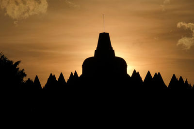 Silhouette of borobudur temple against sky during sunset