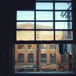 Building seen through glass window