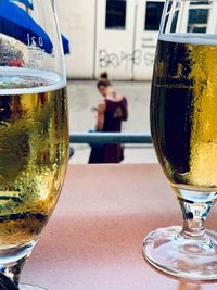 Glass of drink on table in restaurant