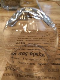 High angle view of glasses on glass