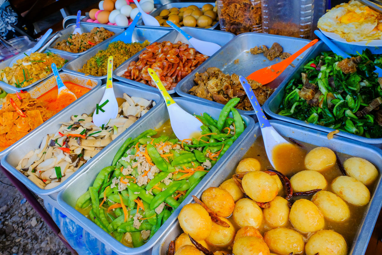 HIGH ANGLE VIEW OF FRUITS FOR SALE IN MARKET STALL