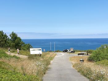 Empty road along sea