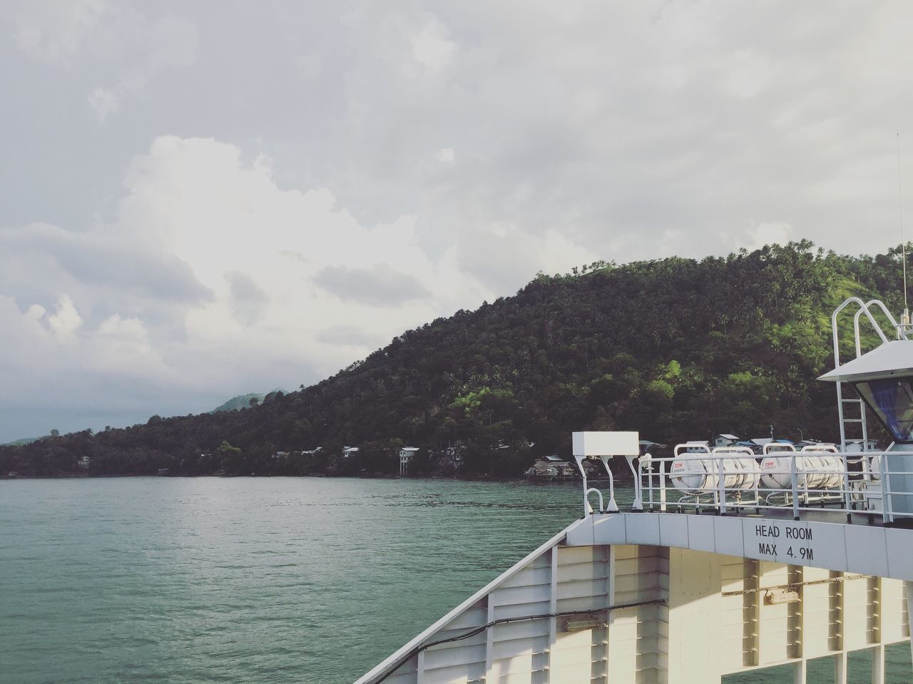 PIER OVER CALM LAKE