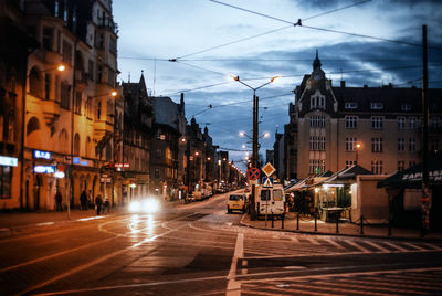 Illuminated city road at night