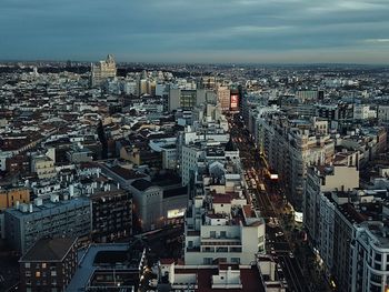 High angle view of modern buildings in city against sky