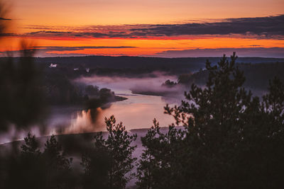 Scenic view of dramatic sky during sunset