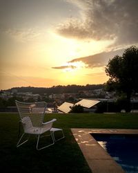 Scenic view of landscape against sky at sunset