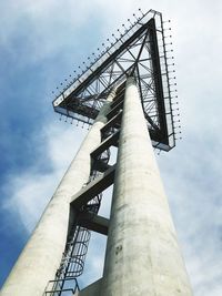 Low angle view of metal structure against sky