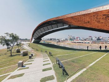 People walking on bridge