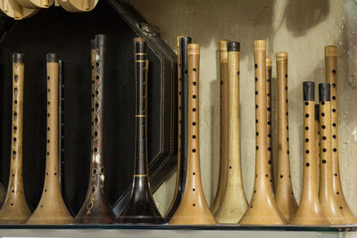 Close-up of clothes hanging on wood