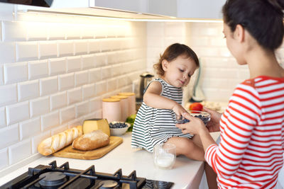 Mother and daughter at home