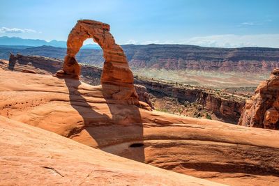 Scenic view of rock formations against sky