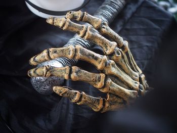 Close-up of human skeleton on table during halloween