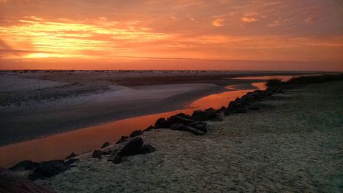 Scenic view of sea at sunset