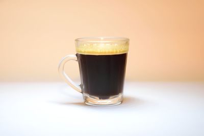 Close-up of coffee cup on table