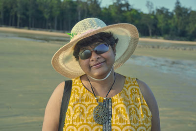 A casual looking indian tourist girl at shankarpur sea beach, in west bengal.