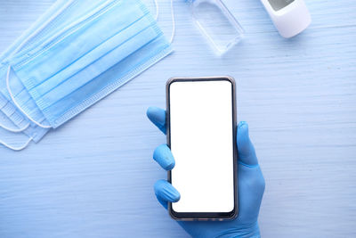 High angle view of mobile phone on table