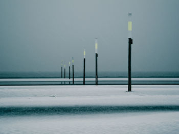 Scenic view of snow against sky during winter