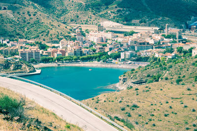 High angle view of sea and cityscape