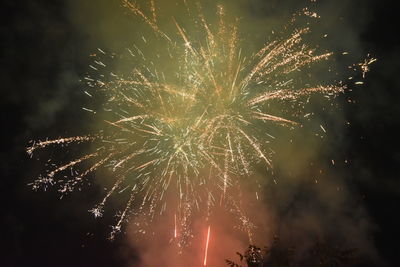 Low angle view of firework display