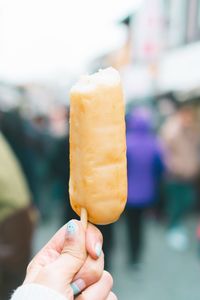 Person holding ice cream cone