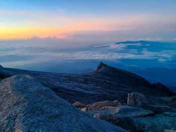 Scenic view of mountain against sky during sunset